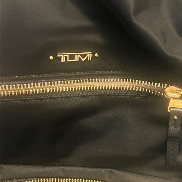 Tumi Halle Black Backpack with Gold Accents